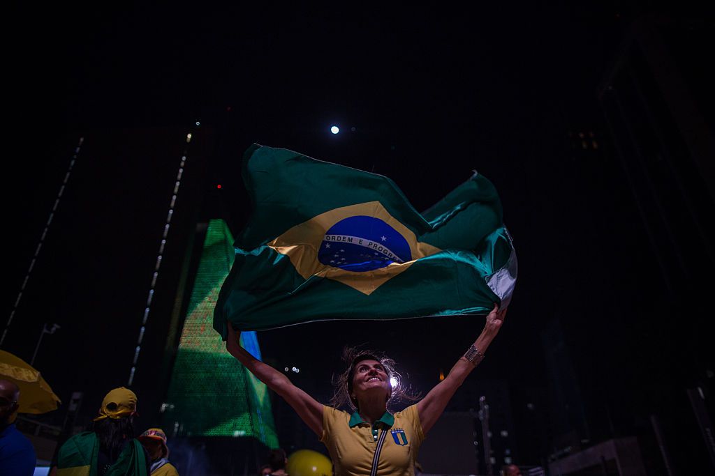 Manifestantes a favor del juicio político contra Dilma Rousseff celebran en las calles de Sao Paulo la decisión del domingo (Crédito: Victor Moriyama/Getty Images)