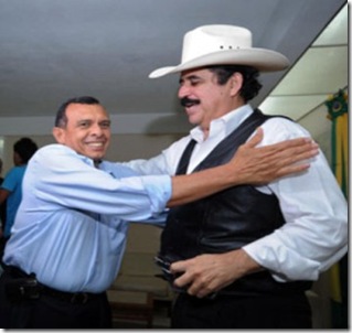Ousted Honduras President Manuel Zelaya (R) receives Honduran presidential candidaate for the National Party, Porfirio Lobo Sosa at the Brazilian embassy compound in Tegucigalpa, September 24, 2009. Ousted Honduras President Manuel Zelaya has been holed up in the Brazilian embassy in Tegucigalpa since Monday. Zelaya, who was deposed in an army-backed coup in June, however said Thursday that "the dialogue has begun" with the de facto government in a bid to seek a peaceful end to the country's political crisis.   AFP   PHOTO / Orlando  SIERRA

