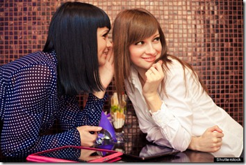 one woman whisper something to friend; Shutterstock ID 98309204; PO: The Huffington Post; Job:  The Huffington Post; Client:  The Huffington Post; Other:  The Huffington Post