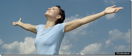 beautiful happy girl posing against the sky; Shutterstock ID 116972632; PO: The Huffington Post; Job: The Huffington Post; Client: The Huffington Post; Other: The Huffington Post