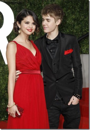 Singer Justin Bieber and singer Selena Gomez arrive at the 2011 Vanity Fair Oscar party in West Hollywood