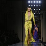 A model presents a creation by Italian designer Donatella Versace as part of her Haute Couture Spring/Summer 2014 fashion show for Atelier Versace in Paris
