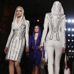 Models present creations by Italian designer Donatella Versace as part of her Haute Couture Spring/Summer 2014 fashion show for Atelier Versace in Paris