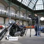 The 1,585 cc Harley Davidson Dyna Super Glide, donated to Pope Francis last year and signed by him on its tank, is displayed ahead of a Bonham's sale of vintage and classic cars at the Grand Palais in Paris