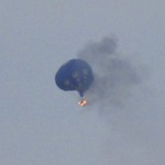 A hot air balloon on fire is pictured north of Richmond