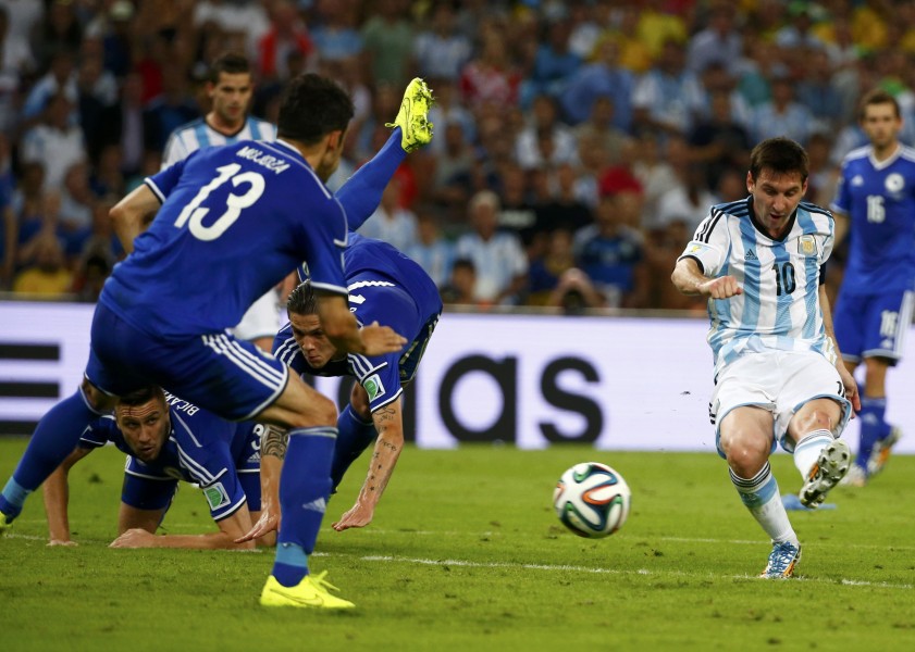 Argentina's Lionel Messi scores a goal during the 2014 World Cup Group F soccer match against Bosnia and Herzegovina at the Maracana stadium in Rio de Janeiro