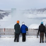 Visitors view frozen Niagara Falls in Niagara Falls New York