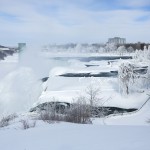 A snow-covered landscape is seen around the frozen Niagara Falls in Niagara Falls, New York