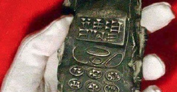 Photo published for Could archaeologists' discovery of '800-year-old mobile phone' prove time travel is real?