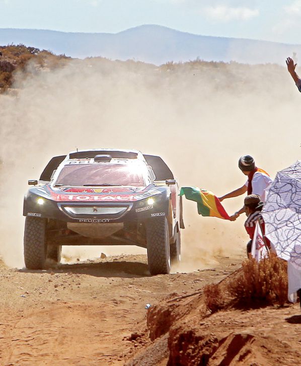 EL PILOTO ESPAÑOL DE PEUGEOT CARLOS SAINZ DURANTE LA NOVENA ETAPA.