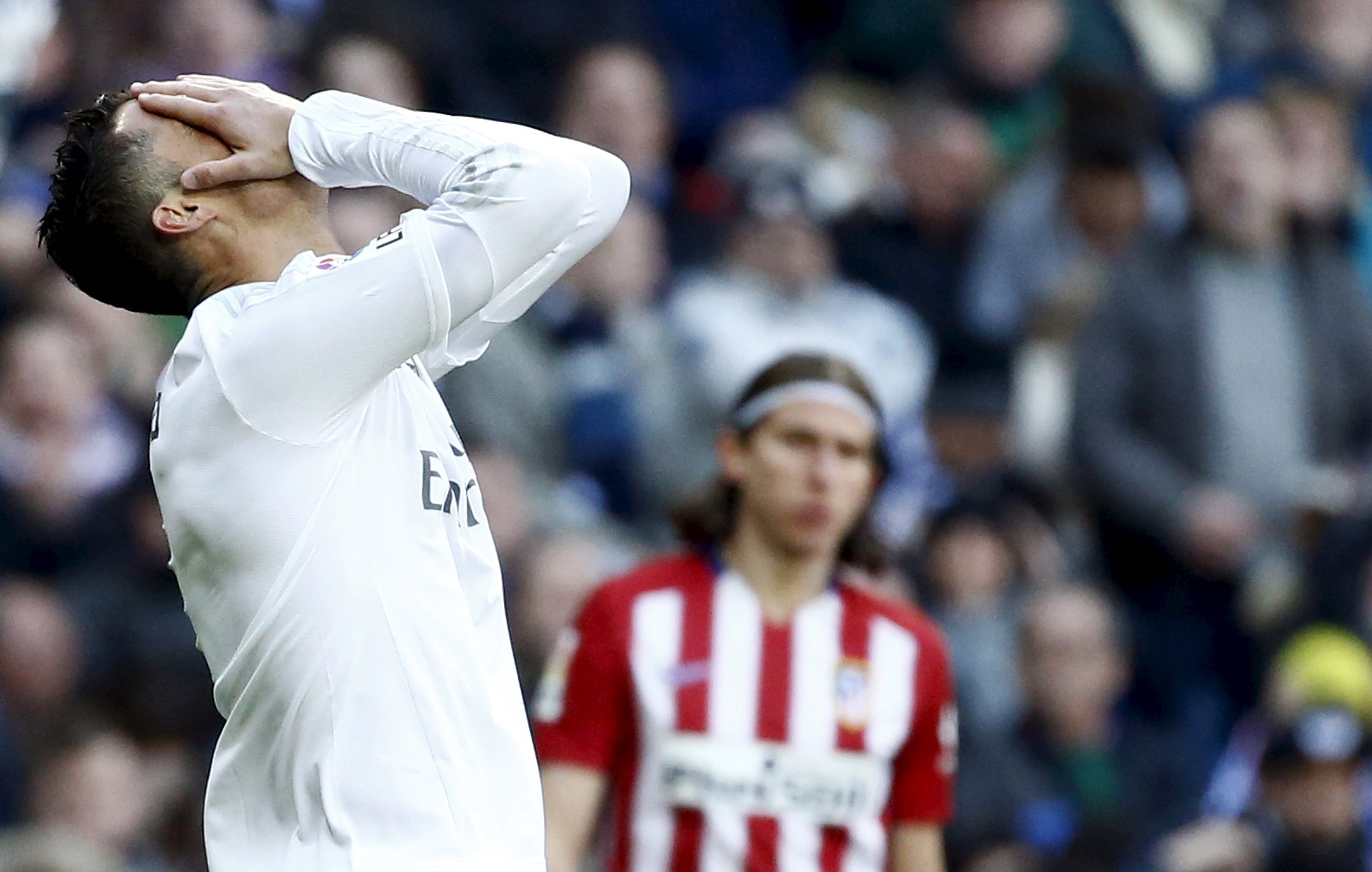 Football Soccer - Real Madrid v Atletico Madrid - Spanish Liga BBVA - Santiago Bernabeu stadium, Madrid, Spain - 27/02/16 Real Madrid's Cristiano Ronaldo reacts during the match. REUTERS/Juan Medina