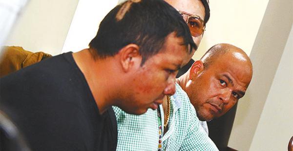 Elías Barba Galarza y el colombiano Nelson Yadir en plena audiencia