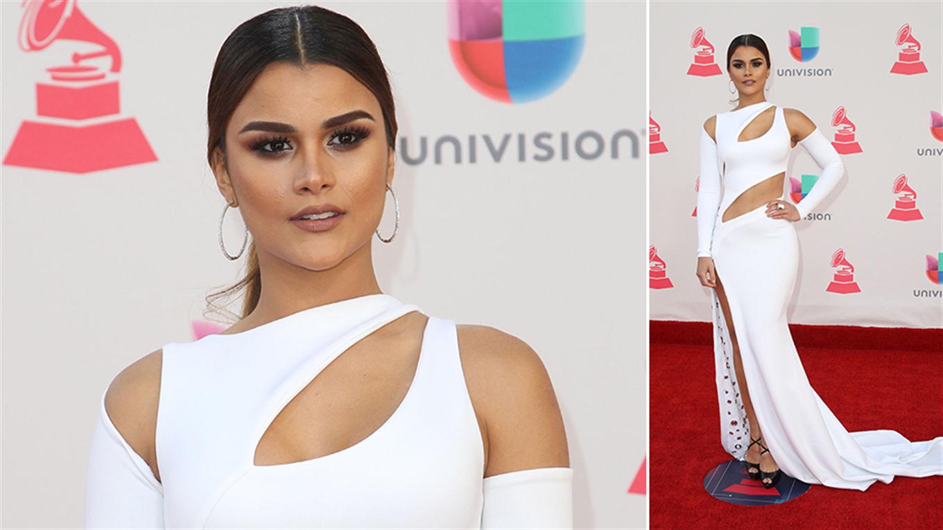 La modelo dominicana Clarissa Molina eligió un diseño blanco con cut-outs, cola con bordados e importante tajo. Foto: Agencias