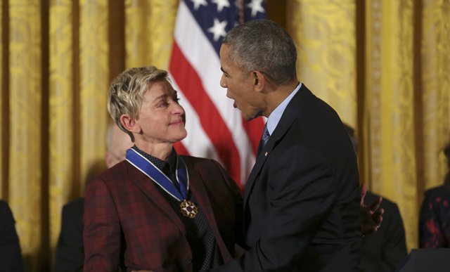 U.S. President Barack Obama reacts with comedian and talk show host Ellen DeGeneres after presenting the Presidential Medal of Freedom to DeGeneres during a ceremony in the White House East Room in Washington, U.S., November 22, 2016. REUTERS/Carlos Barria