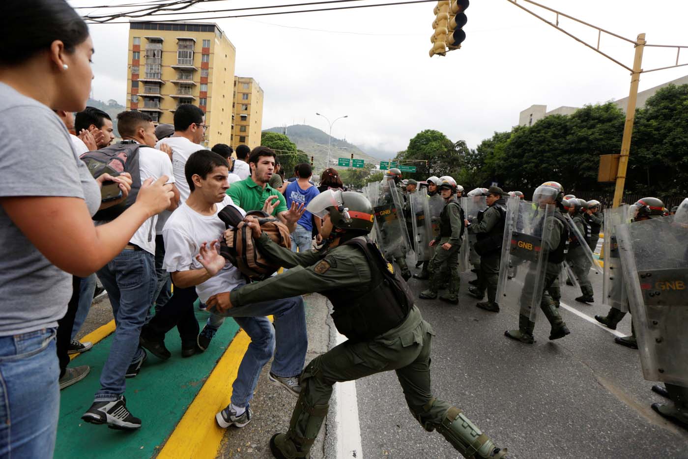 Opposition supporters clash with Venezuela