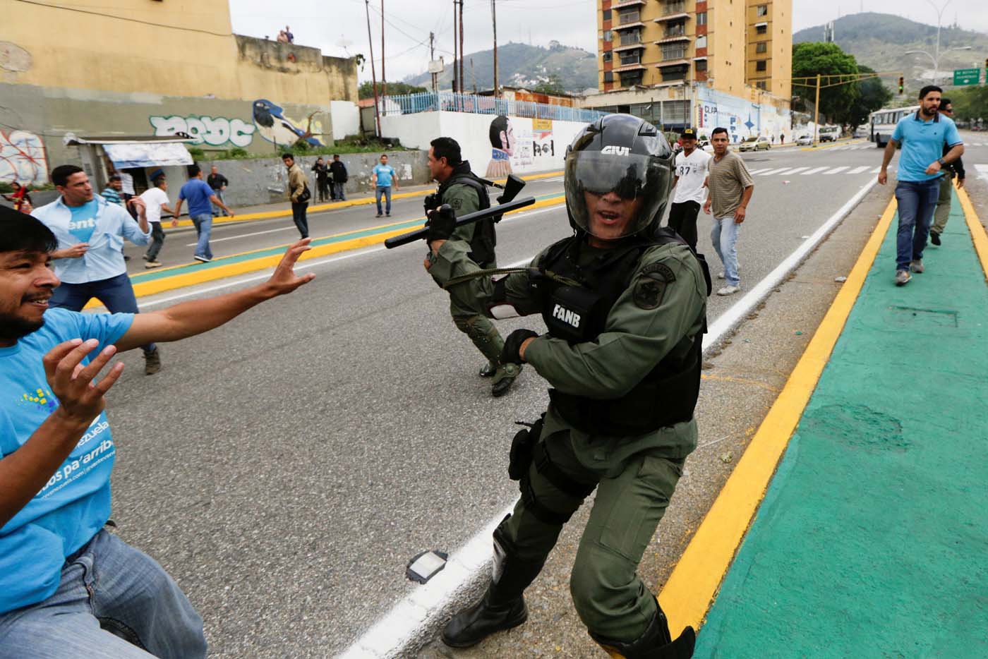 Opposition supporters clash with Venezuela