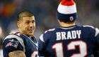 FOXBORO, MA - DECEMBER 10: Tom Brady #12 of the New England Patriots chats with Aaron Hernandez #81 against the Houston Texans at Gillette Stadium on December 10, 2012 in Foxboro, Massachusetts. (Photo by Jim Rogash/Getty Images)