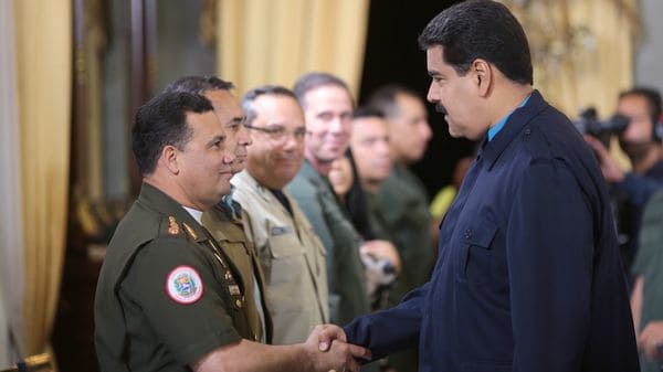 Gustavo González López junto a Nicolás Maduro