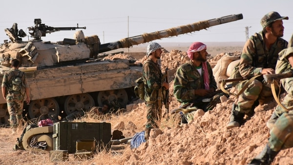 Tropas sirias combatiendo en Deir Ezzor (AFP)
