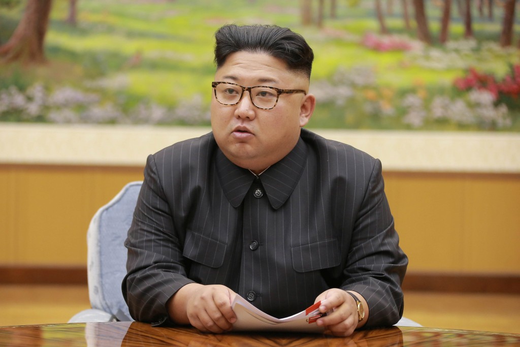 North Korean leader Kim Jong Un participates in a meeting with the Presidium of the Political Bureau of the Central Committee of the WorkersÕ Party of Korea in this undated photo released by North Korea