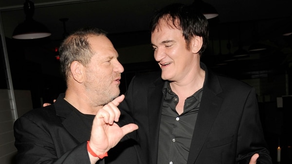 Weinsten y Tarantino, quien confesó no haber hecho lo suficiente para denunciar a Weinstein (Getty Images)