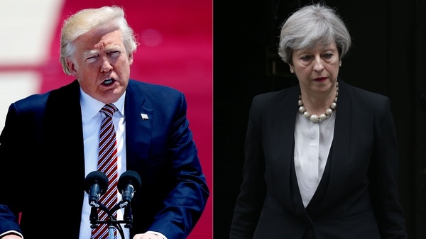 Donald Trump y Theresa May (AFP)