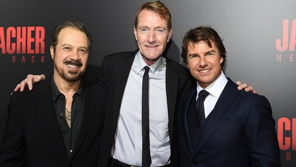 El director Edward Zwick, el escritor Lee Child y el actor Tom Cruise (Getty Images)