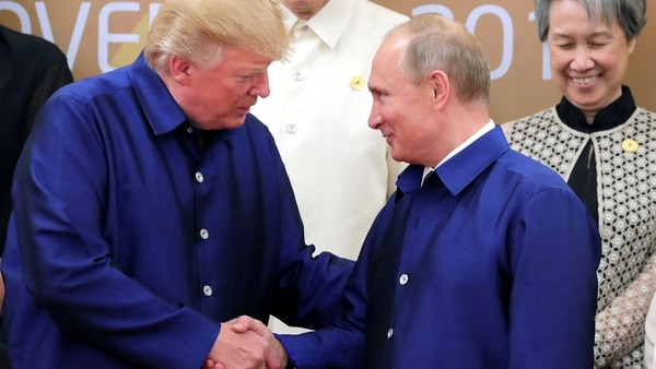 Donald Trump junto a Vladimir Putin (Reuters)