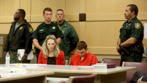 El asesino, con la cabeza gacha durante la audiencia (Reuters)