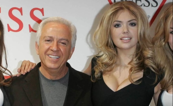 Paul Marciano y Kate Upton. Paul Marciano debió dar un paso al costado de la empresa. (AP)
