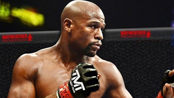 Mayweather estaría preparándose para pelear MMA con ayuda de Tyron Woodley, campeón de UFC