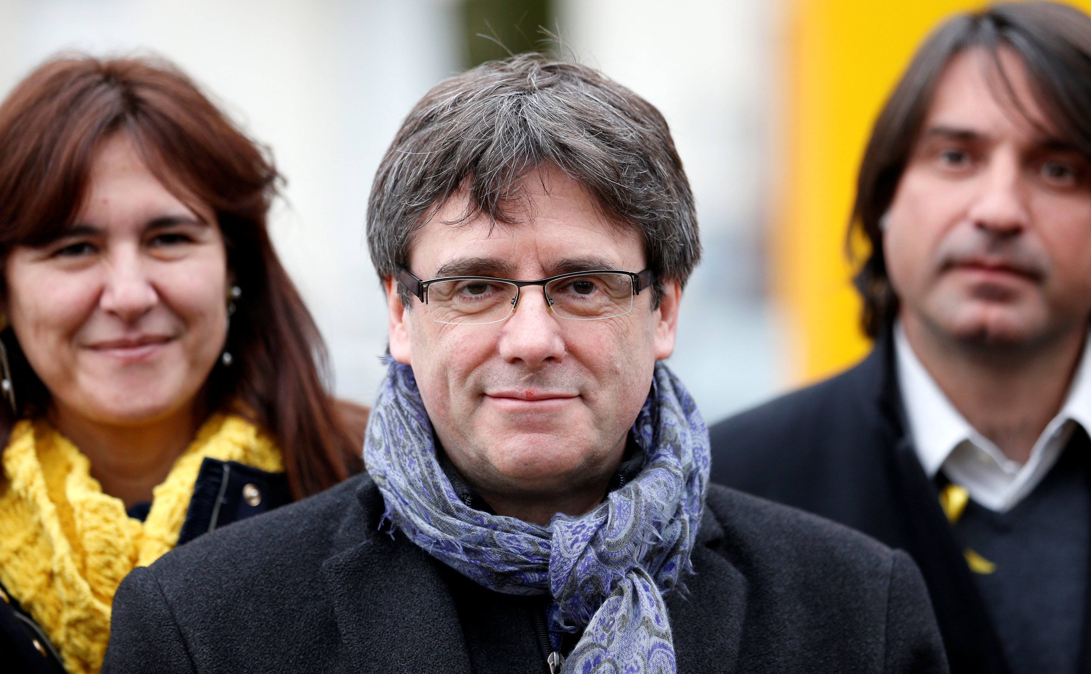 Former Catalan leader Carles Puigdemont attends a meeting with his party