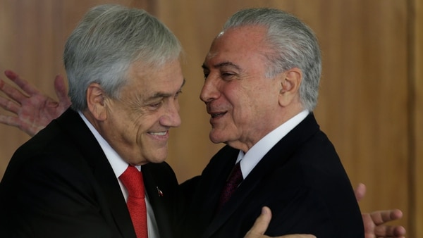 Chile y Brasil negocian un mejor pacto comercial (EFE)
