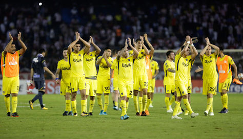 Jugadores de Boca celebran el empate conseguido ante Junior