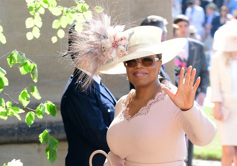 US presenter Oprah Winfrey arrives for the wedding ceremony of Britain