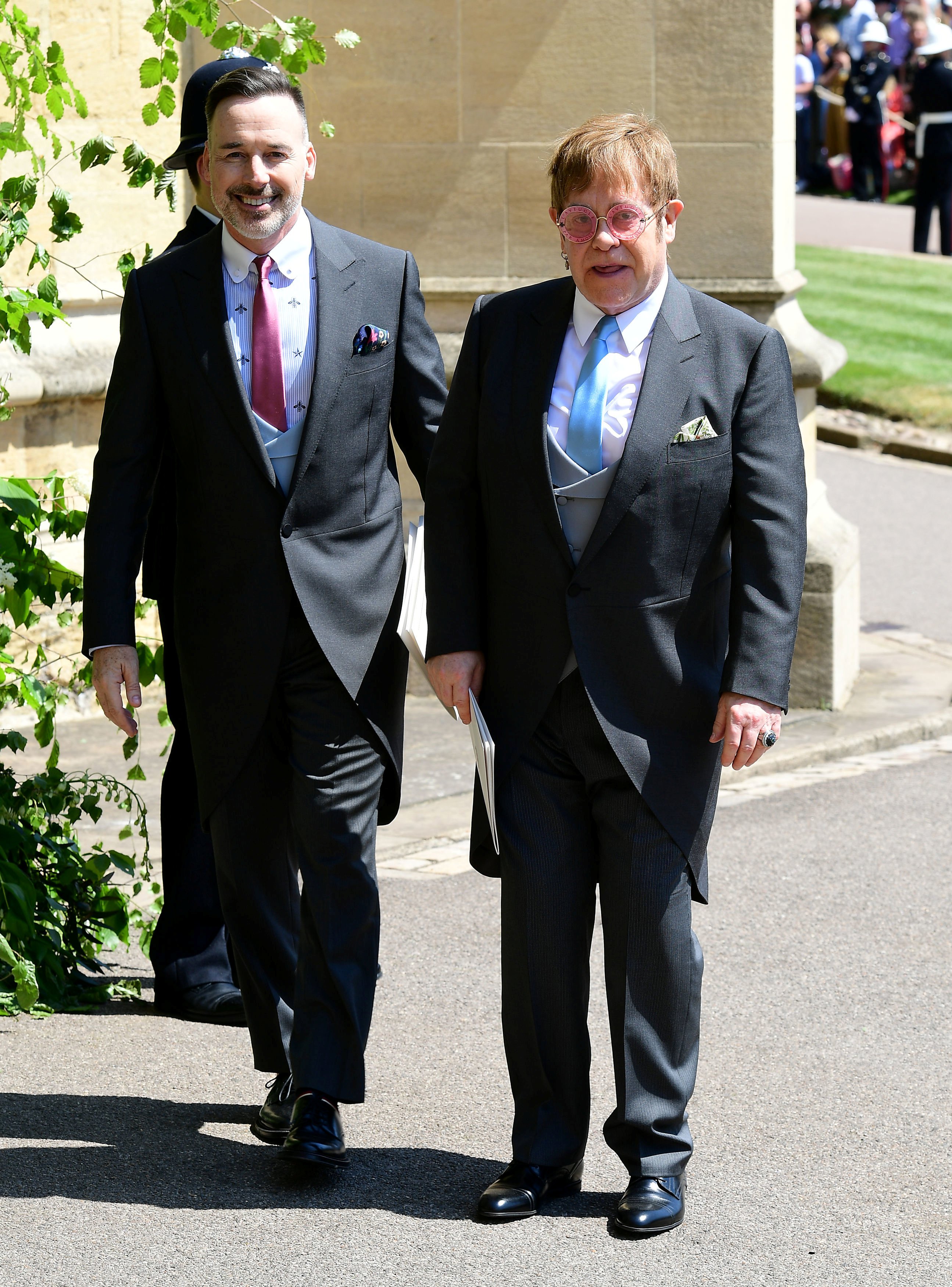 David Furnish and Elton John leave St George