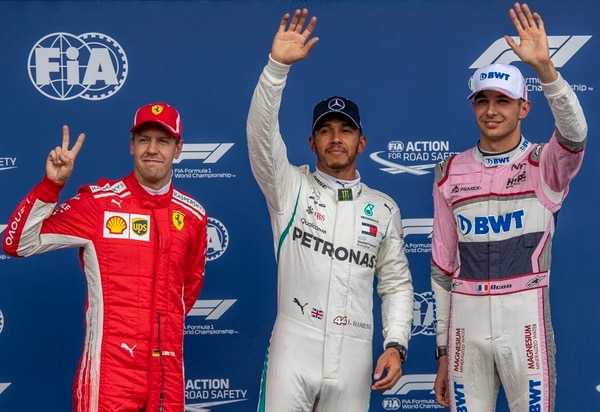 Lewis Hamilton, Sebastian Vettel y Esteban Ocon (EFE)