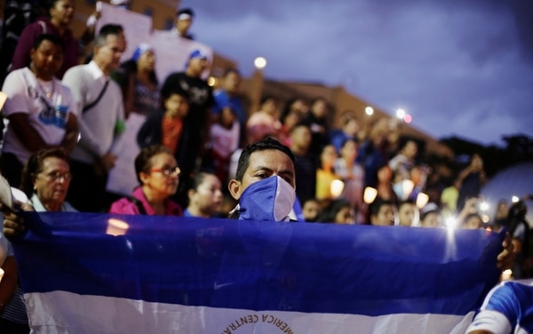 People in support of Nicaraguan protesters who are opposing Nicaraguan President Daniel Ortega, rally at the La Democracia square in San Jose, Costa Rica August 11,2018. REUTERS/Juan Carlos Ulate