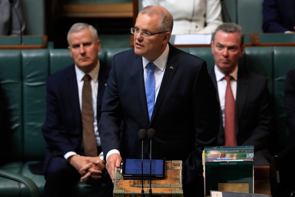 El primero ministro australiano Scott Morrison durante sus disculpas a las víctimas de pederastia en la Cámara de los Comunes en Canberra. (SEAN DAVEY / AFP)