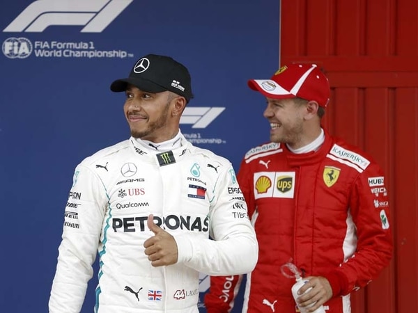 Lewis Hamilton (i) y Sebastian Vettel (EFE)