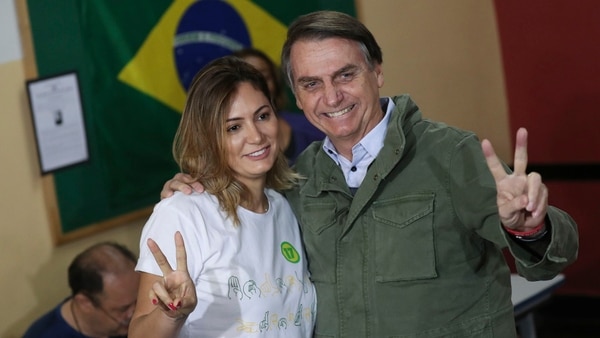 Michelle y Jair Bolsonaro, en la votación del domingo (AFP)