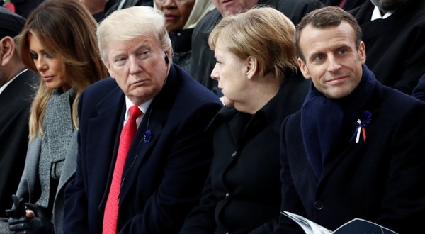 Los mandatarios de EEUU, Alemania y Francia en el evento en París por el centenario del armisticio (Reuters)