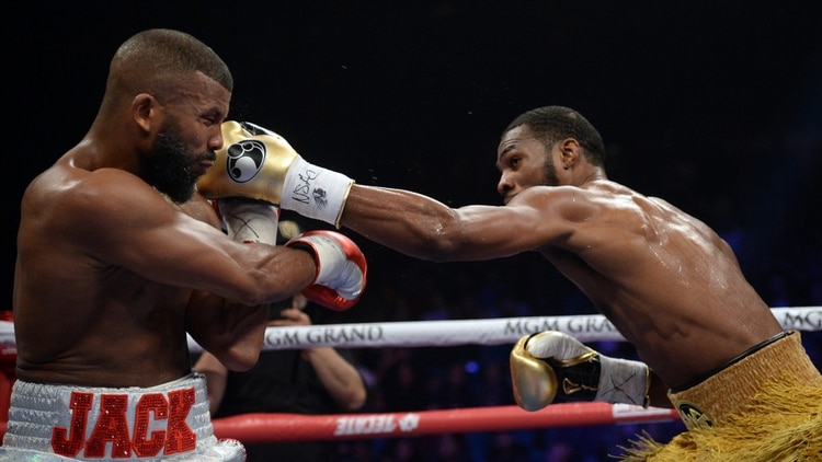 Jan 19, 2019; Las Vegas, NV, USA; Badou Jack (silver trunks) and Marcus Browne (gold trunks) box during a WBA Interim & WBC Silver light heavyweight boxing match at MGM Grand Garden Arena. Mandatory Credit: Joe Camporeale-USA TODAY Sports
