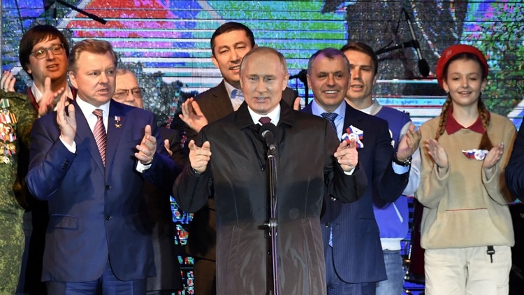 El presidente ruso, Vladimir Putin, durante las celebraciones por los cinco años desde la anexión de Crimea. El gobernante ha impulsado la modernización de los arsenales de Rusia (AFP)