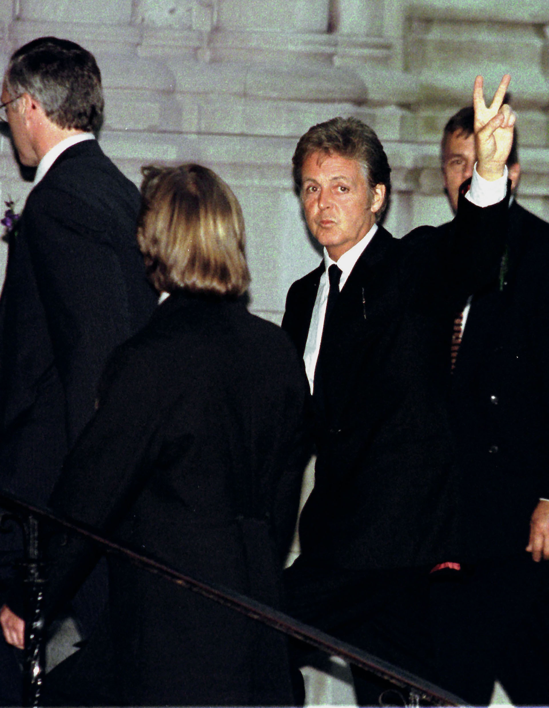 Paul McCartney waves to the [media] as he arrives at the New York Riverside Church for a memorial service for his wife Linda McCartney in New York June 22. The service for Linda McCartney, who died in April from breast cancer at the age of 56, was not open to the public or press, but an order of ceremony was released in advance.