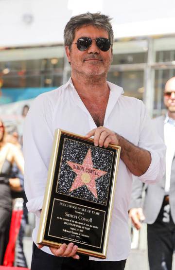 Simon Cowell con su estrella de fama, en Los Ãngeles, el pasado agosto.
