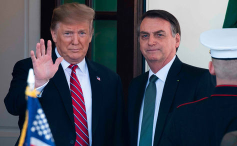 Trump y Bolsonaro (der.) durante un encuentro anterior. Foto: AFP