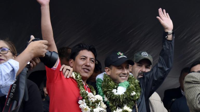 Marco Pumari y Fernando Camacho | AFP