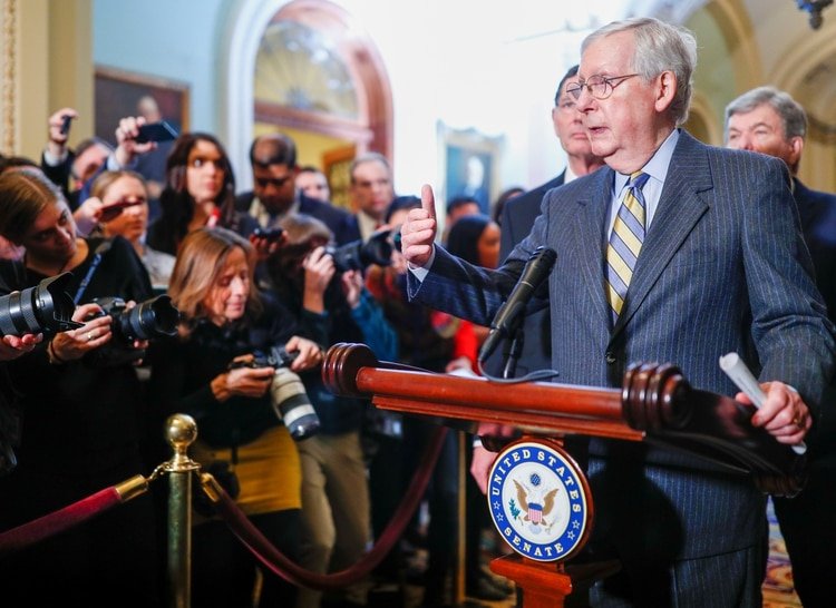 U.S. Senate Majoprity Leader Mitch McConnell (R-KY) speaks to Capitol Hill reporters following the weekly Senate Republican policy lunch at the U.S. Capitol in Washington, U.S., January 14, 2020. REUTERS/Tom Brenner