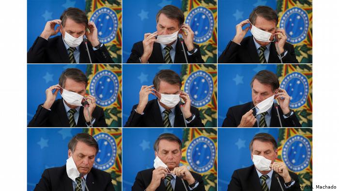 Coronavirus in Brasilien Präsident Jair Bolsonaro kämpft mit Mundschutz (Reuters/A. Machado)